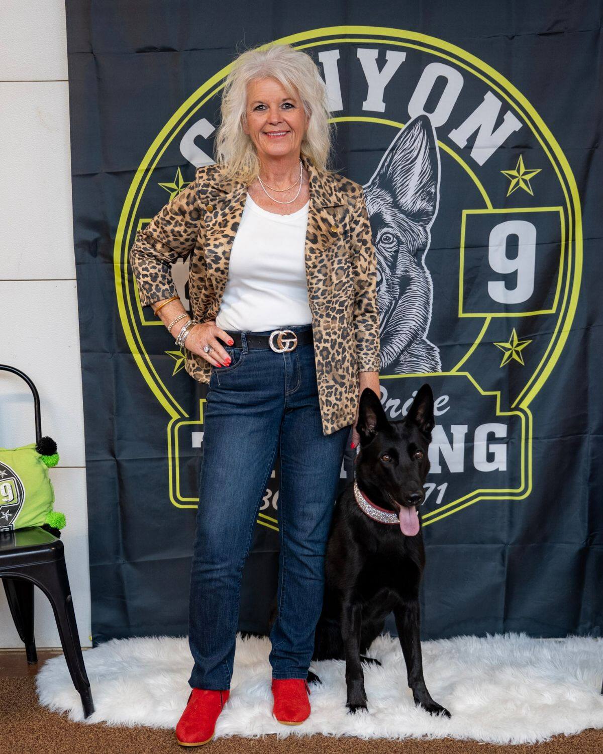 Lisa Price with a black shepherd at Canyon K9 Training